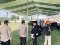 Polres Tulang Bawang Barat Laksanakan Pengamanan Kegiatan Pengesahan Warga PSHT di Lapangan Tiyuh Marga Kencana